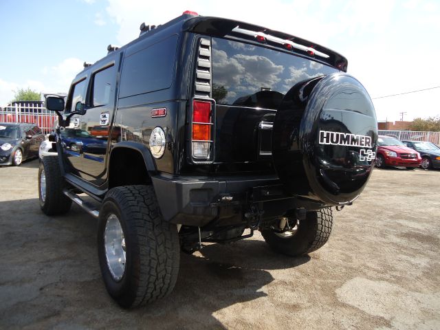 2003 Hummer H2 Scion XB