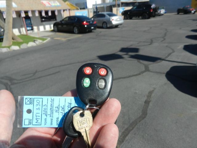 2003 Hummer H2 Scion XB