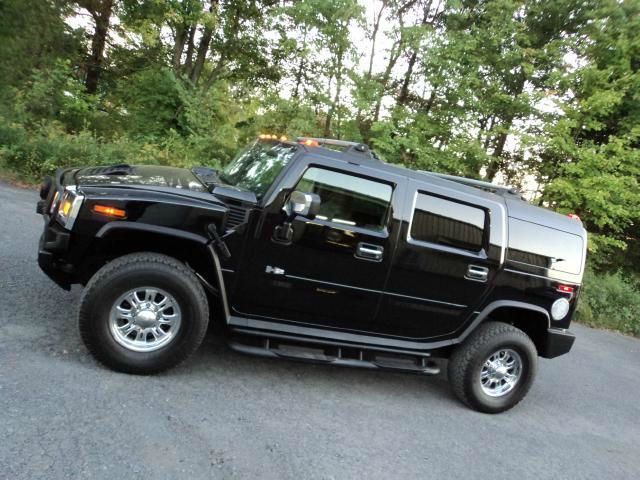 2003 Hummer H2 Scion XB