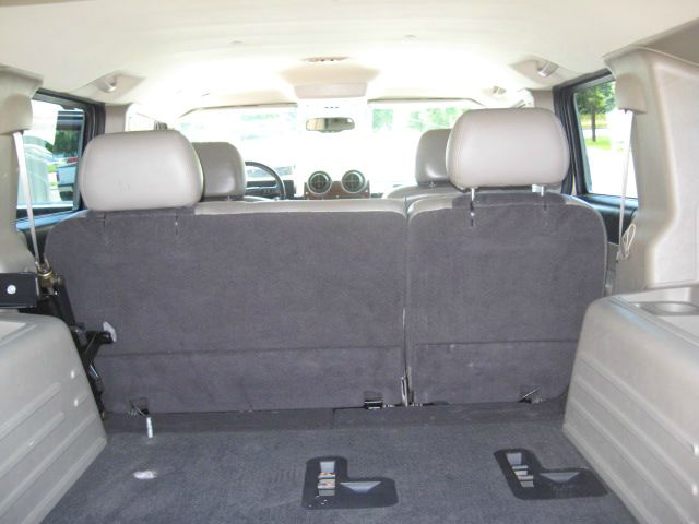 2003 Hummer H2 Scion XB