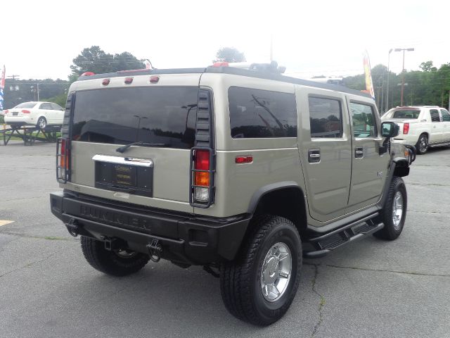 2003 Hummer H2 Scion XB