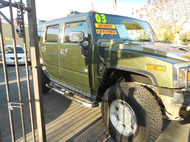 2003 Hummer H2 Scion XB