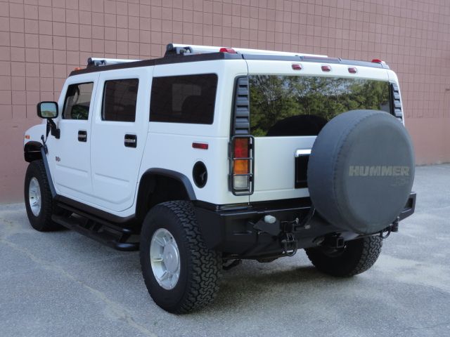 2003 Hummer H2 2007 Nissan Enthusiast