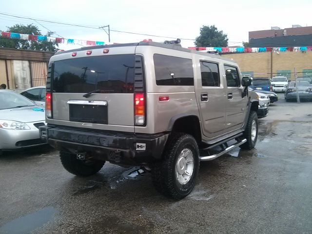 2003 Hummer H2 Scion XB