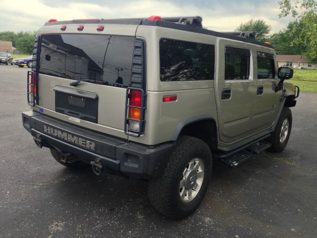2003 Hummer H2 Scion XB