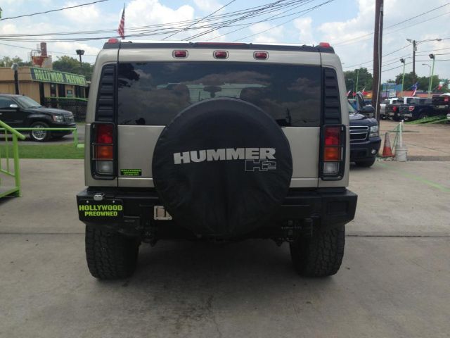 2003 Hummer H2 Scion XB