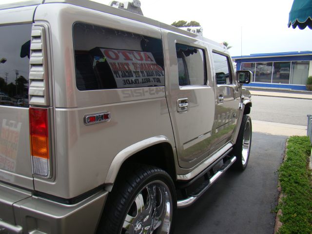 2004 Hummer H2 Scion XB