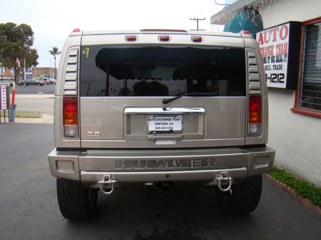 2004 Hummer H2 Scion XB