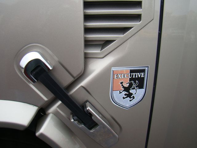 2004 Hummer H2 Scion XB