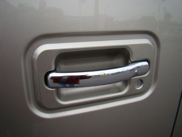 2004 Hummer H2 Scion XB