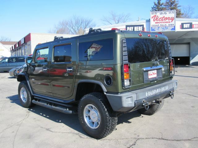 2004 Hummer H2 Scion XB