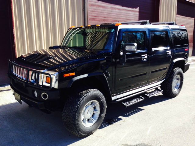 2004 Hummer H2 Scion XB