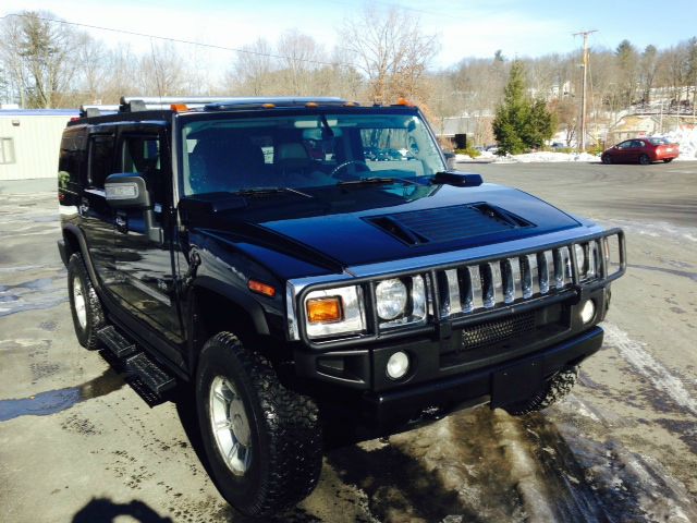 2004 Hummer H2 Scion XB