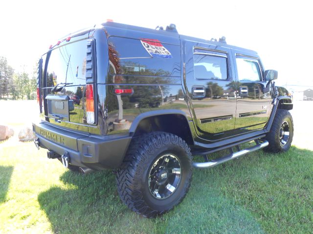 2004 Hummer H2 Scion XB