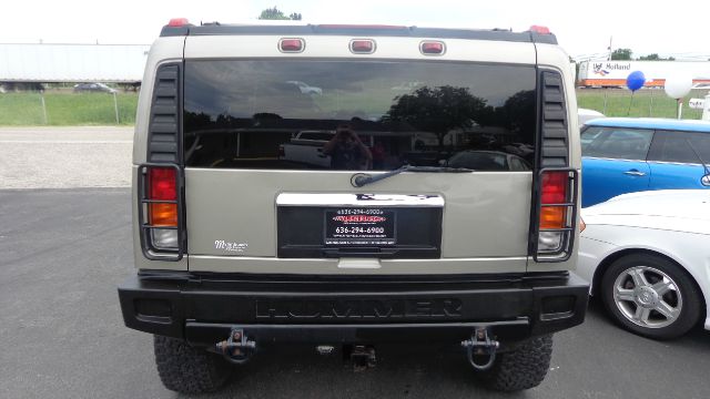 2004 Hummer H2 Scion XB