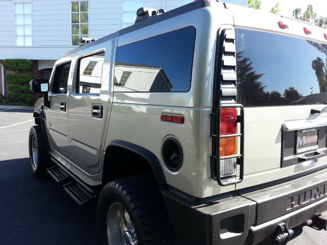 2004 Hummer H2 Scion XB