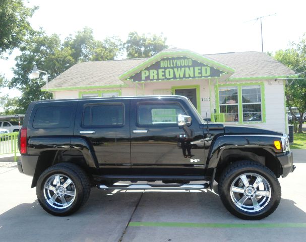 2006 Hummer H3 Scion XB