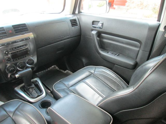 2006 Hummer H3 Scion XB