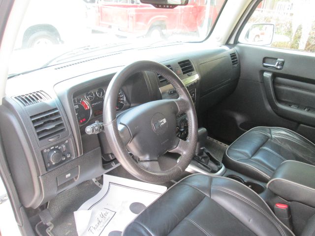 2006 Hummer H3 Scion XB