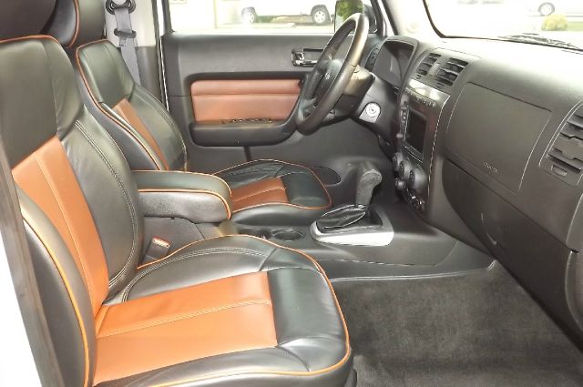 2006 Hummer H3 Scion XB