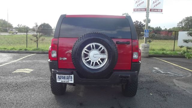 2006 Hummer H3 Scion XB