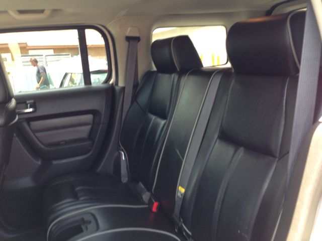 2006 Hummer H3 Scion XB