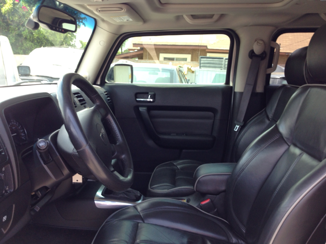 2006 Hummer H3 Scion XB