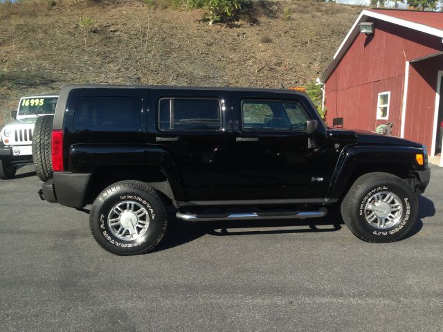 2006 Hummer H3 Scion XB