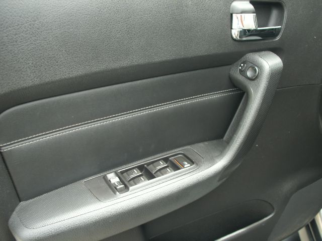 2006 Hummer H3 Scion XB