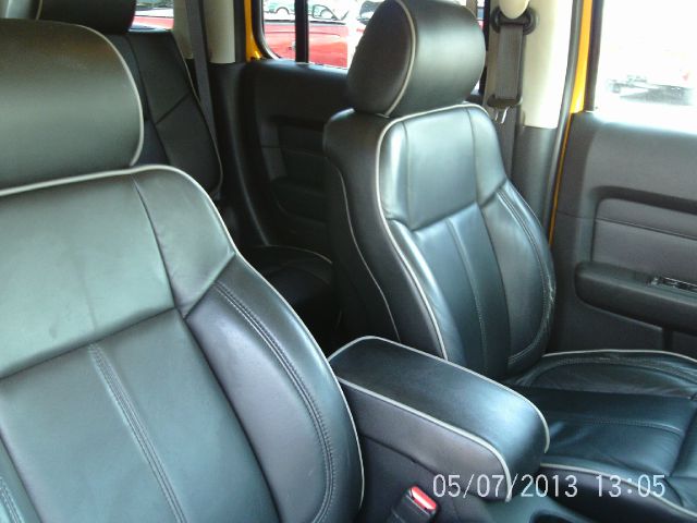 2006 Hummer H3 Scion XB