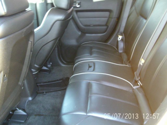 2006 Hummer H3 Scion XB