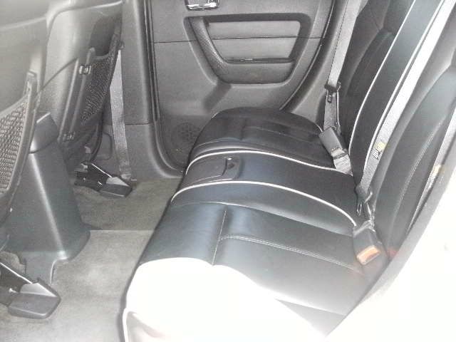 2006 Hummer H3 Scion XB