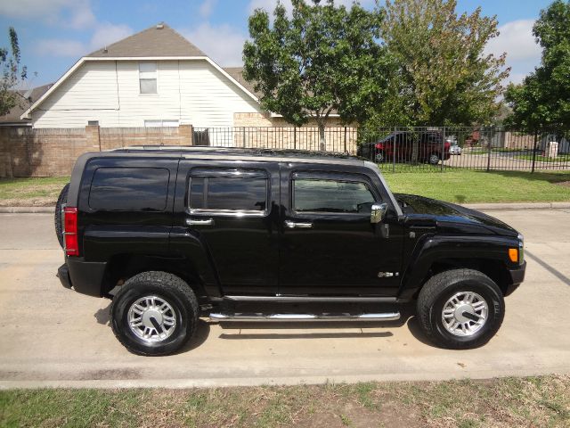 2006 Hummer H3 Scion XB
