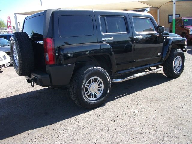 2006 Hummer H3 Scion XB