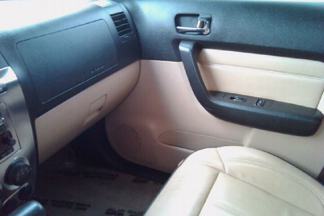 2006 Hummer H3 Scion XB