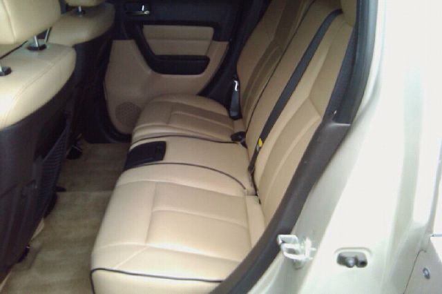 2006 Hummer H3 Scion XB