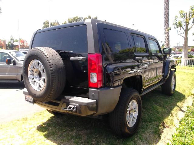 2006 Hummer H3 Scion XB