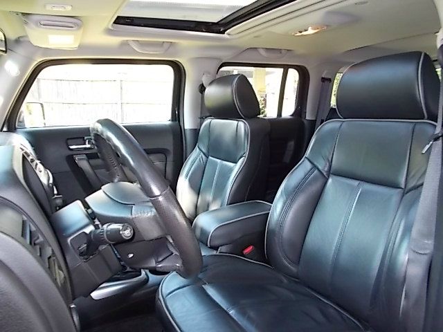 2006 Hummer H3 Scion XB