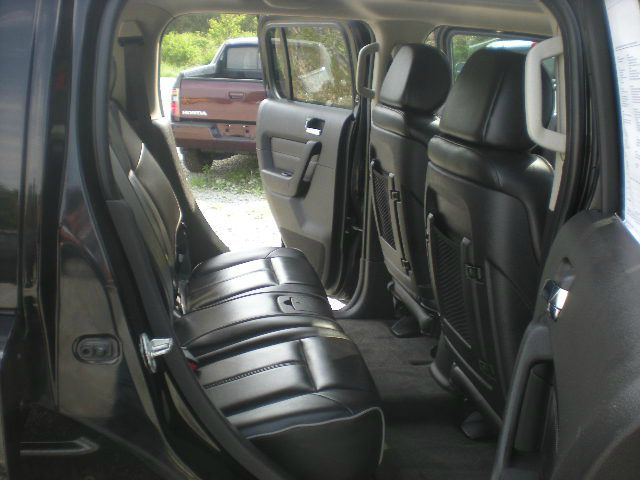 2006 Hummer H3 Scion XB