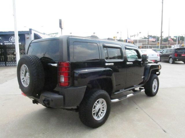 2006 Hummer H3 Scion XB