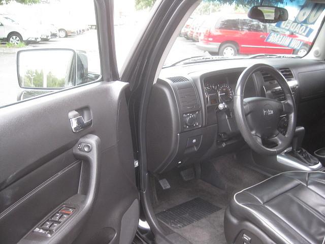 2006 Hummer H3 Black,with Blue Strip