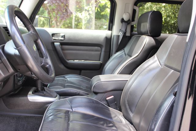 2006 Hummer H3 Scion XB