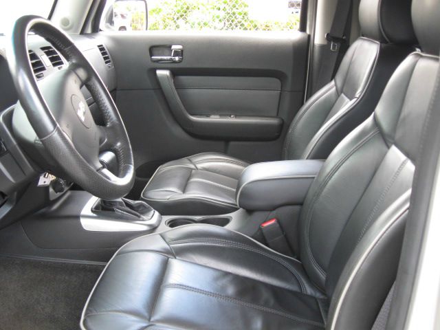 2006 Hummer H3 Scion XB
