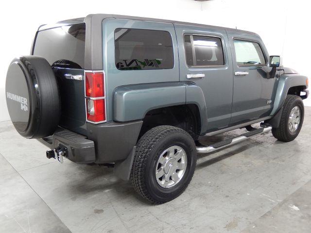 2006 Hummer H3 Scion XB