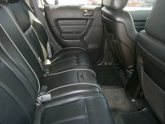 2007 Hummer H3 Scion XB