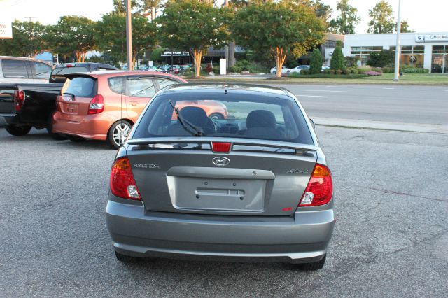 2003 Hyundai Accent 2000 Dodge SLT