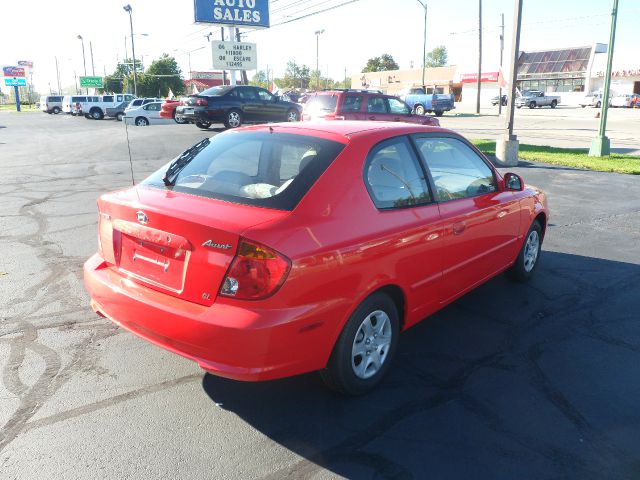 2003 Hyundai Accent 2000 Dodge SLT