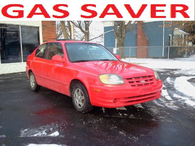 2003 Hyundai Accent 2000 Dodge SLT