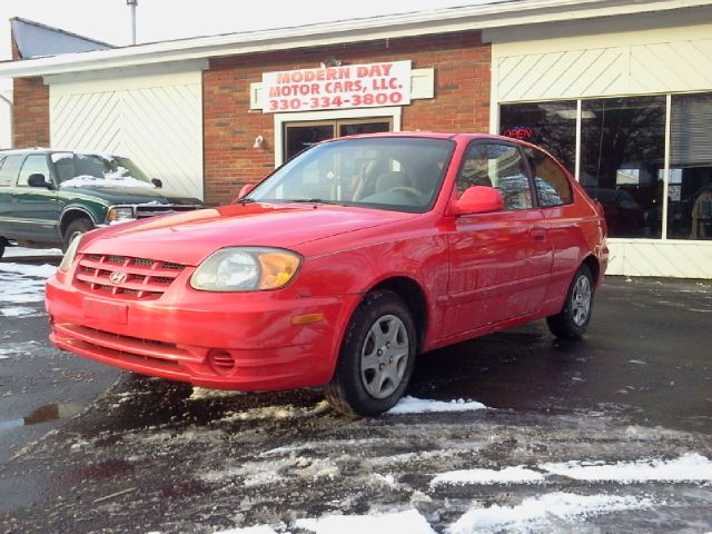 2003 Hyundai Accent 2000 Dodge SLT