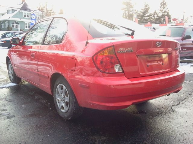 2003 Hyundai Accent 2000 Dodge SLT